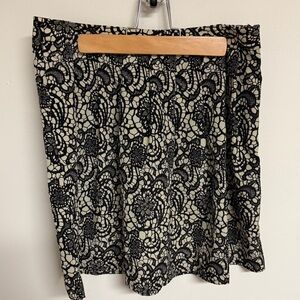 Hinge silky lace pattern mini skirt size size 4
